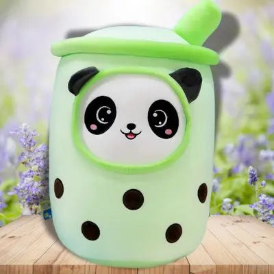 peluche bubble tea panda vert souriant douce assise au jardin