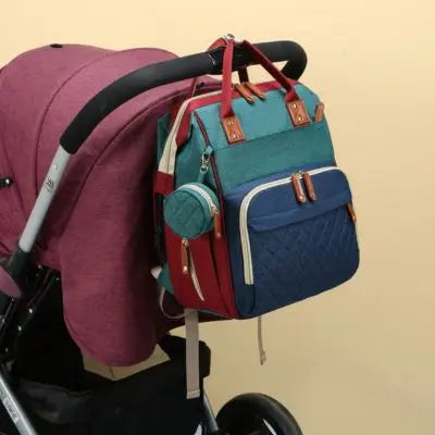 sac à dos vert-et-bleu-adapté-pour-poussette