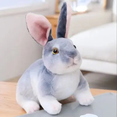 Peluche lapin réaliste au pelage luisant gris et yeux d'or