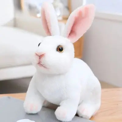 Peluche lapin réaliste uniformément blanc aux yeux dorés
