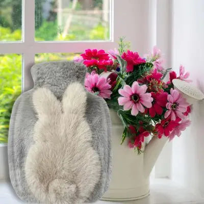 Bouillotte peluche le doudou lapin-quatre-saisons de confort et de chaleur