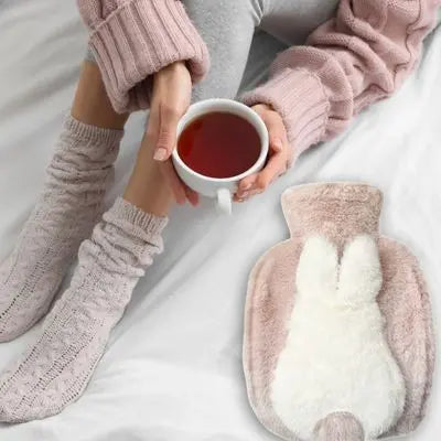 Bouillotte peluche doudou lapin-rose-et-blanc-réchauffant les pieds