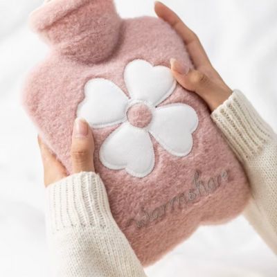 Bouillotte peluche pour des économies d'électricité peluche stitch