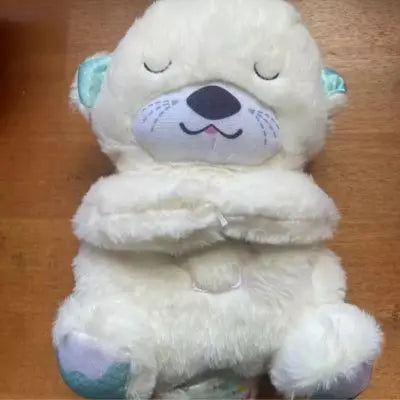 Doudou loutre blanche une peluche loutre qui respire