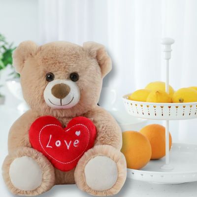 Ours en peluche Teddy bear le beau et soyeux nounours parmi les fruits