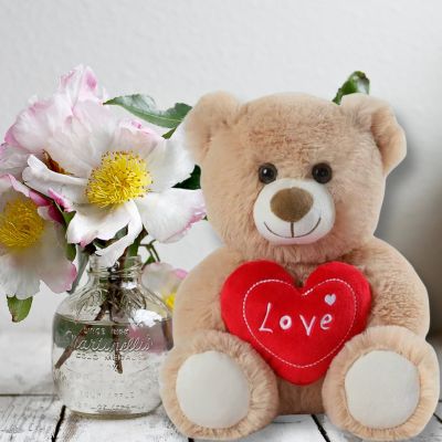 Ours en peluche Teddy bear mignon nounours sous les roses blanches