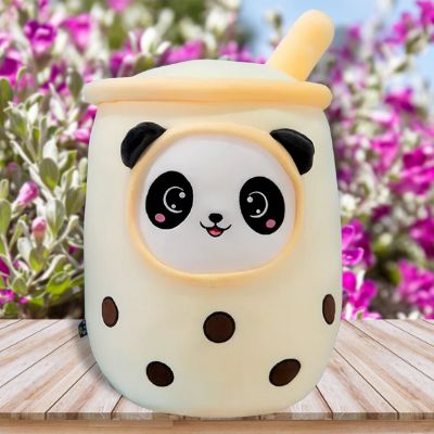 peluche bubble tea panda jaune chic et chatoyant parmi les fleurs