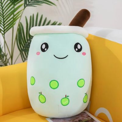 Peluche bubble tea-peluche kawaii souriant au jus de pommes assis au sofa