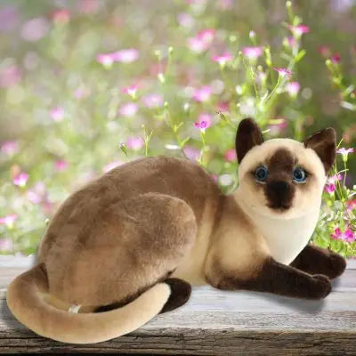 Peluche chat réaliste époustouflant peluche chat magique entre les fleurs 