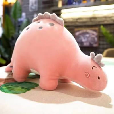 Peluche dinosaure le rose une vraie douceur ludique pour petits garçons