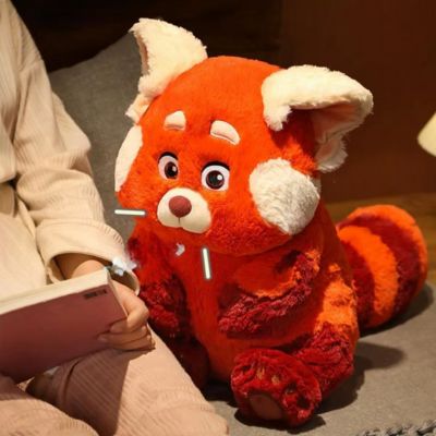 Peluche kawaii l'excellent et beau renard avec un garçon qui lit 