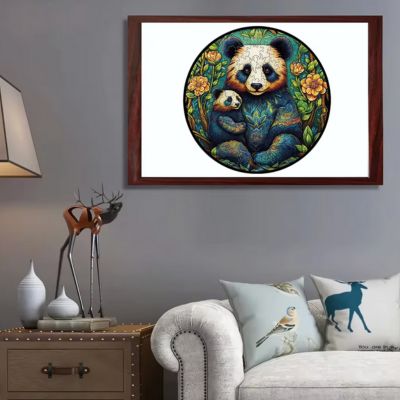 Puzzle en bois beau panda dans la foret avec bébé encadré au mur gris