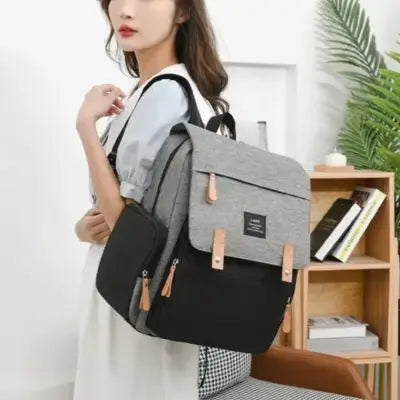 Sac a langer moderne et léger avec-fllle chez-elle