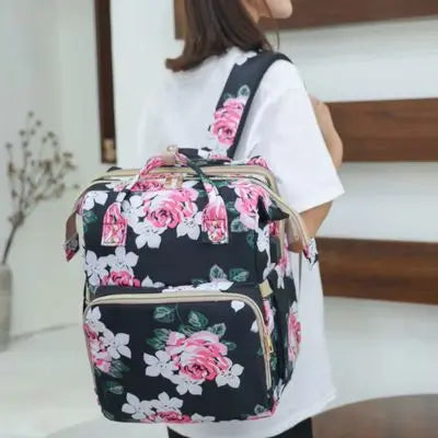 Sac à langer-floral-noir-aux-roses-claires